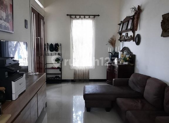 For Sale Minimalist House 2 Floors with Laundry Area and Drying Space, Clean Good Condition Ready to Occupy, Wide Road Row, Environment with One Gate System, Strategic Location Near Airport and Unidha Campus in Grand Devina Estate Cluster, Malang City H198 2