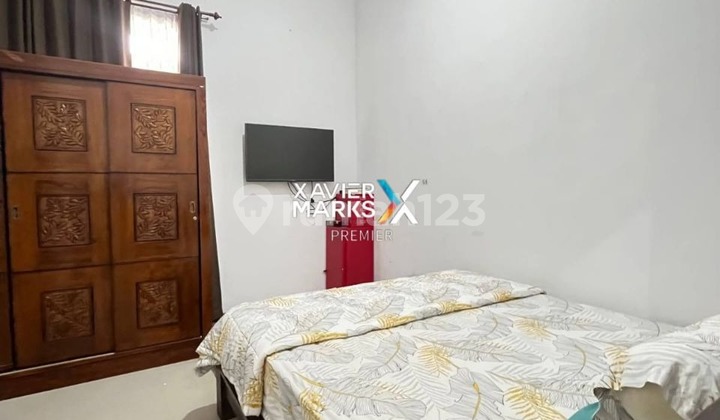 FOR SALE Well-Maintained Minimalist Hook House Fully Furnished Move-In Ready Just Bring Your Suitcase One Gate System Steps Away to Al-mahira IIBS and Close to Culinary Center Easy Access to Batu Tourism at Tirtasani Singosari Malang City G755