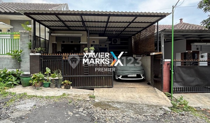 For Sale Well-Maintained House in Good Condition, Clean, Move-In Ready with Complete Facilities, Safe Environment with 24-Hour Security, Central City Location Near Plaza Araya and Hotel Mercure, Easy Access to Karanglo Toll Exit in Puri Kartika, Malang City H035 For Sale Well-Maintained House in Good Condition, Clean, Move-In Ready with Complete Facilities, Safe Environment with 24-Hour Security, Central City Location Near Plaza Araya and Hotel Mercure, Easy Access to Karanglo Toll Exit in Puri Kartika, Malang City H035