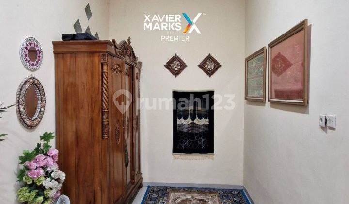 For Sale Beautiful Modern 2-Story House in Good Condition with Fish Pond, Ready to Move In. Safe Environment with CCTV and One Gate System. Strategic Location Near City Center and Easy Access to Various Places on Jl Warinoi Sulfat, Malang City H519. 2