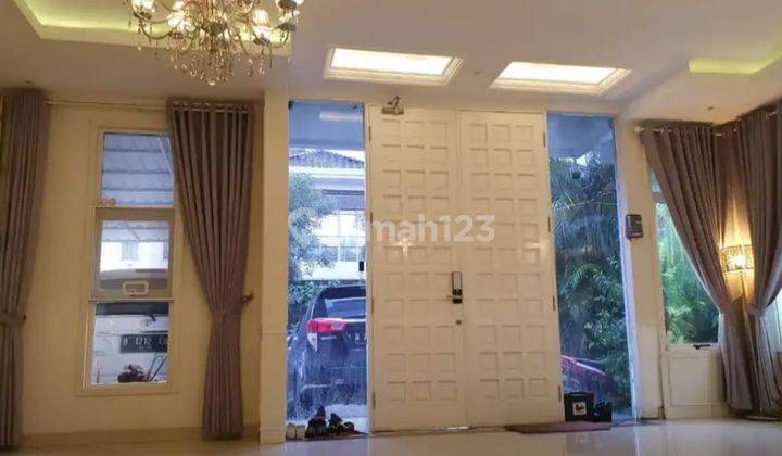 Rumah Hoek Puri Mansion 2 Lantai 4 Kamar Carport Luas Semi Furnished Bagus 1