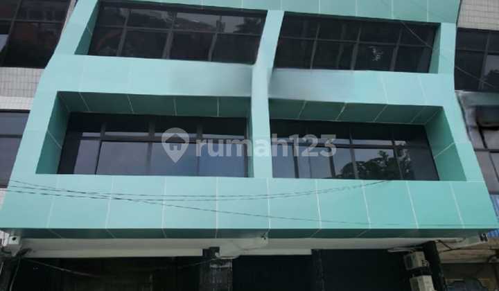 For Sale 2 Units of Adjacent Shophouses on Sumatera Street, Gubeng, Central Surabaya - Spacious Car Parking.