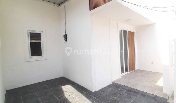 Rumah SHM Hadap Selatan 14 menit ke Summarecon Mall Bekasi Dibantu KPR J25769 2