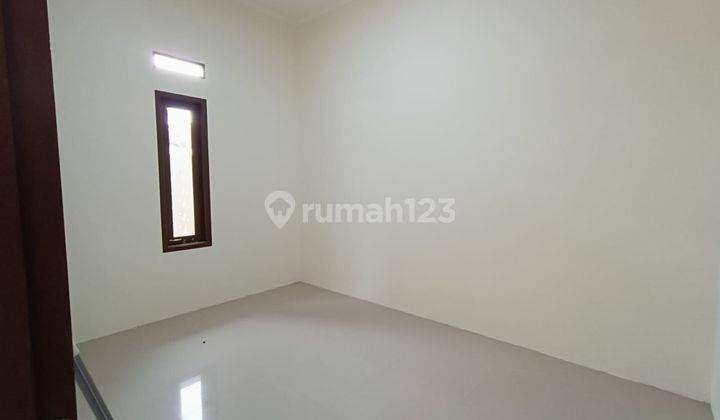 Rumah Harga Nego Bebas Banjir 10 menit ke Plaza Taman Harapan Baru Siap KPR J25869 2