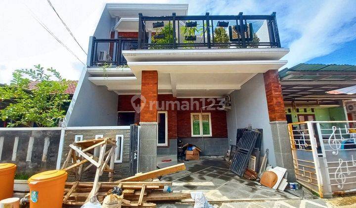 Rumah Terawat 2 Lt Akses Dekat ke Terminal Sawangan Hadap Utara J21428 1