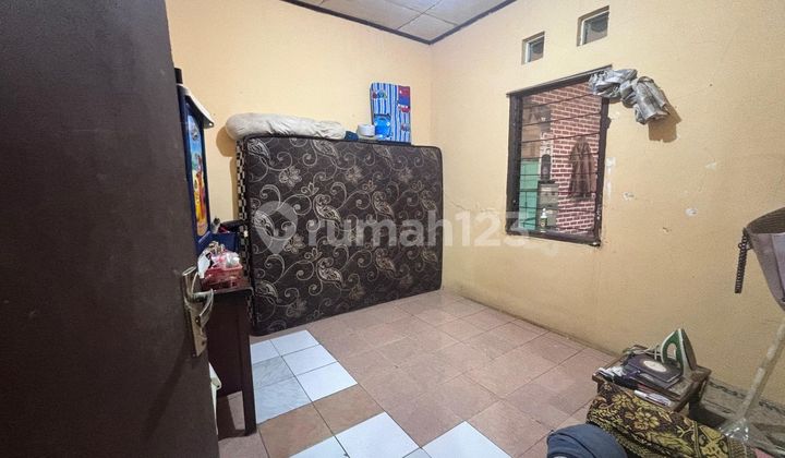 Rumah Hadap Selatan 13 Menit ke Terminal Parung Dibantu KPR J-42829 2