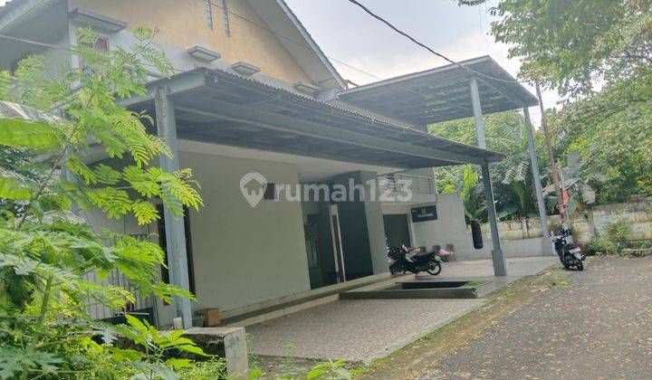 RUMAH DENGAN SWIMMING POOL DI JALAN PANDA RAYA PONDOK RANJI  1