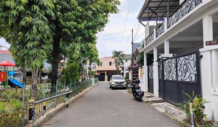 RUMAH CANTIK HOOK 2LT dlm KOMPLEK depan FASUM di BUARAN DUREN SAWIT 2