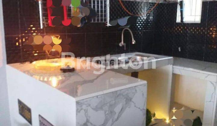 Rumah full renovasi lokasi mata merah depan 