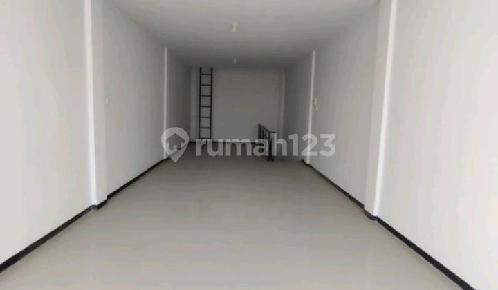 Shop house frontage on Ahmad Yani Street, in front of the Regional Police Office. 2