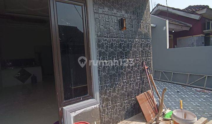 Rumah siap huni full Renovasi Luas 72 m² Minimalis Modern Citra Indah City