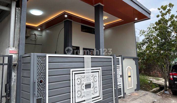 Rumah Minimalis Modern A Lots Of Bonus  Luas 90 M² Di Citra Indah City 2