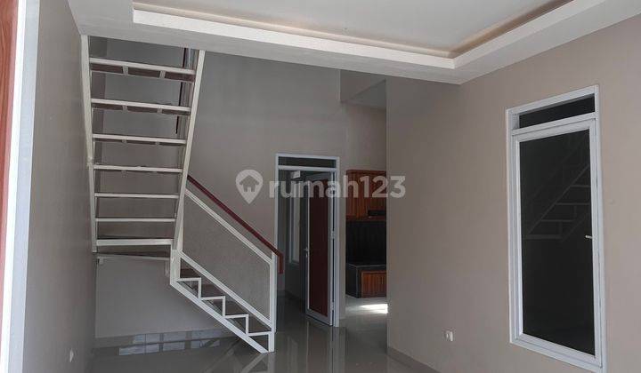Rumah Modern Desain Scandinavian Extra Mezzanine Depan Lapangan Fasum Lt 72 M² Di Citra Indah City 2