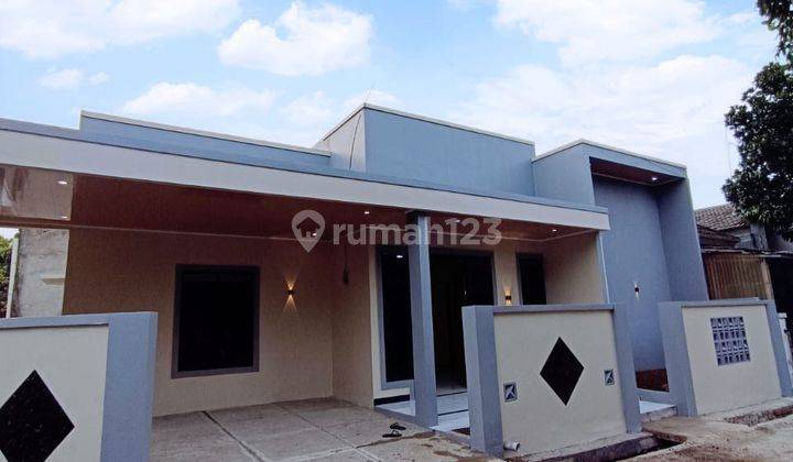 Rumah Hook Cantik Dengan Pintu Butterfly Luas 157 M² Di  Citra Indah City  2