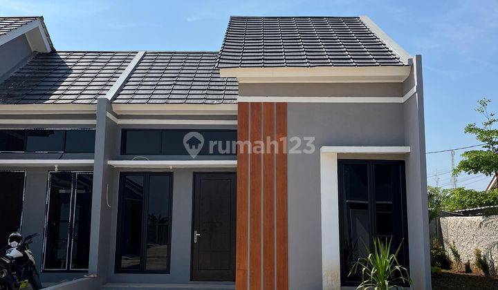 Rumah Cluster murah antara dipinggir jalan Setu Bekasi  1