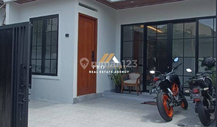 garasi/carport dijual rumah huni 2 lantai