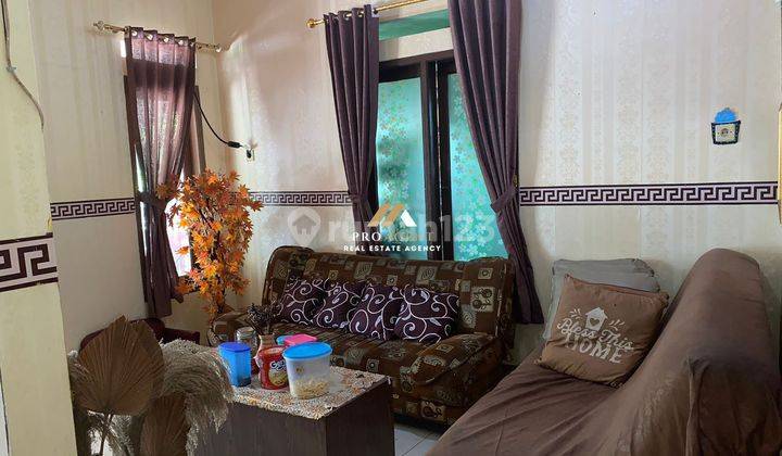 ruang tamu dijual rumah huni dekat tol