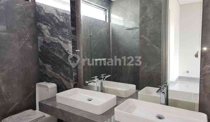 GRESS Rumah Modern Split Level Pakuwon Indah 2