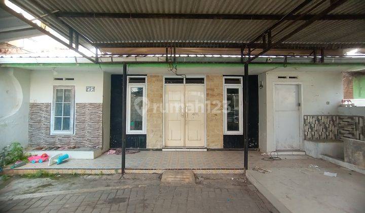 Rumah di Jalan Gajahmada Butuh Renovasi Unfurnished 1