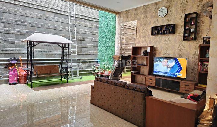 Dijual rumah siap huni terawat shm di taman holis indah 1minimalis modern 1