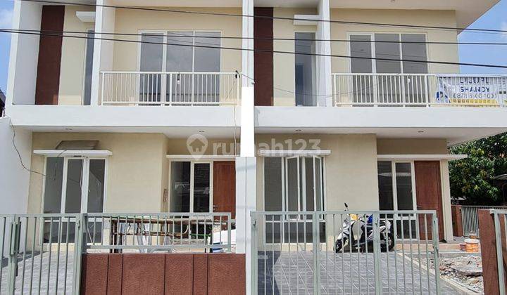 DIJUAL UNIT READY RUMAH 2 LANTAI MODERN MINIMALIS - BELIMBING , PONDOK TJANDRA INDAH, SIDOARJO 1