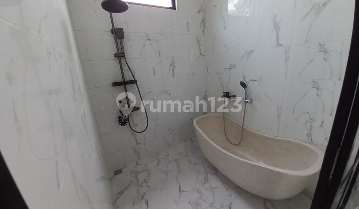 NEW CLASSIC TYPE HOUSE FRONTING GREEN AREA IN SENTUL CITY 2