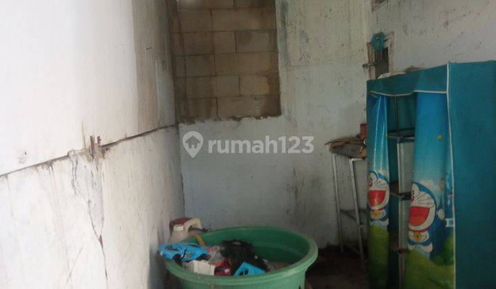 Di oper murah Rumah di pinggir jalan raya sepatan 4