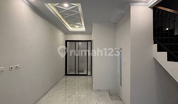 Ready-to-Occupy House in Tanah Baru Beji Depok 2 Floors + Rooftop Garden 2