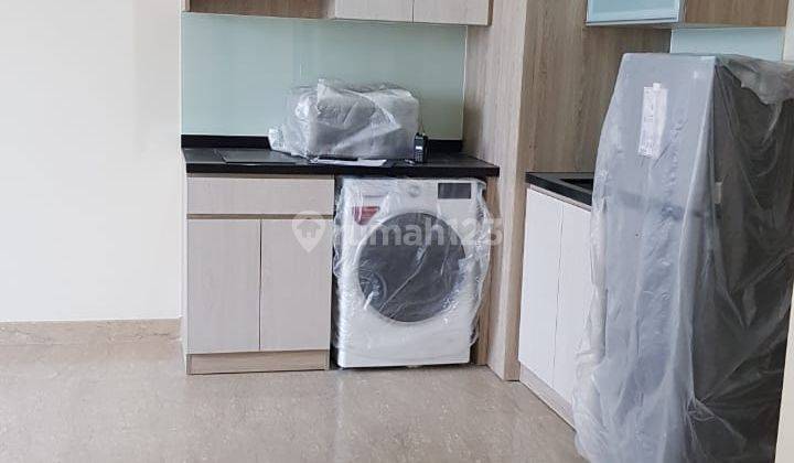 Menteng Park Apartemen Tower Emerald 2 BR Semi Furnished Baru 1