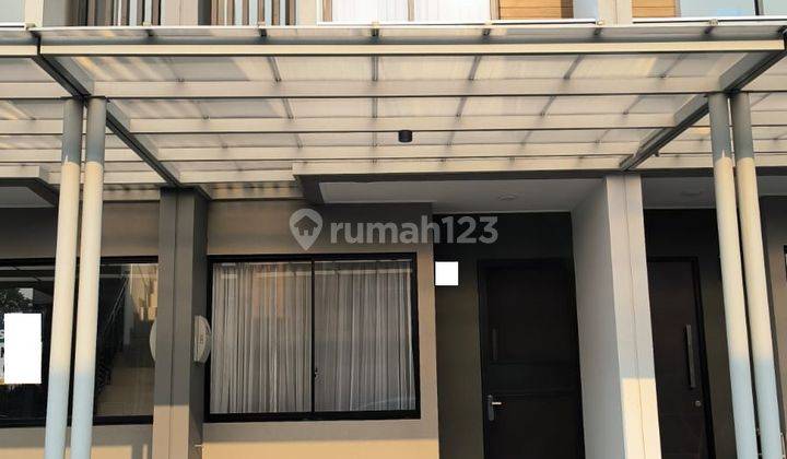 Rumah 2 LT Siap Huni Cluster Nuansa Danau 4x15m Semi Furnished 1