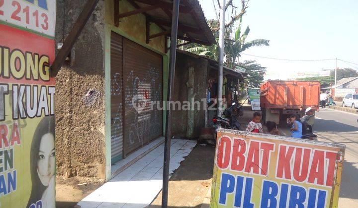 RUMAH DAN KIOS JL CIPUTAT PARUNG JALUR STRTEGIS 1