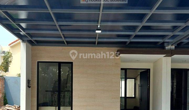 Jual RUGI Rumah hadap jalan besar dalam cluster di Jakarta Garden City 1