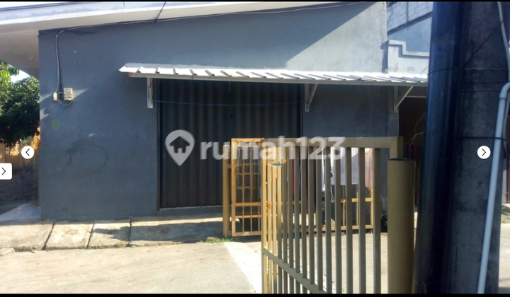 Selling cheap, 3 rental houses facing the field in Dasana Indah housing complex.