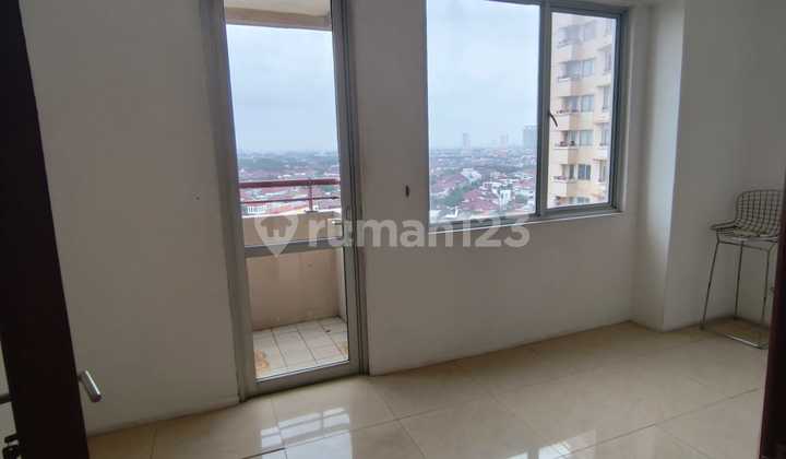 Mid-Floor Unfurnished Apartment at Paladian Park, Kelapa Gading, North Jakarta 2