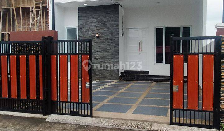 Rumah Baru Townhouse SHM dekat gerbang tol Grand Wisata  1