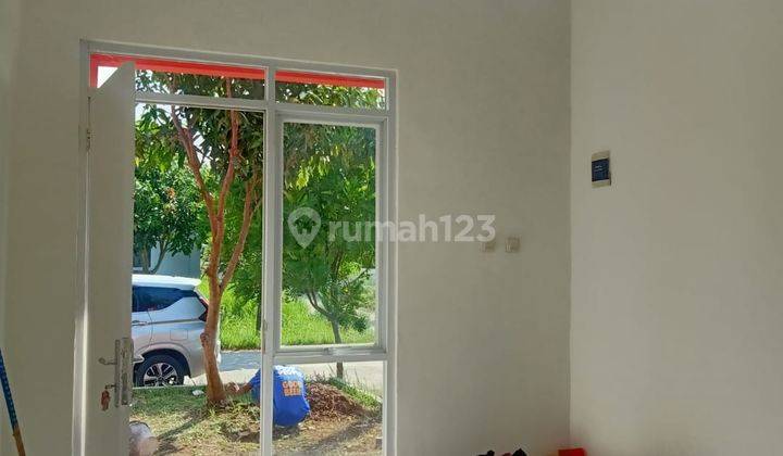 ruang tamu rumah di perumnas dramaga cluster