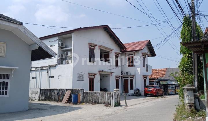 JUAL RUGI KOST2N 32 KMR DAN RUMAH PETAKAN 23 KAMAR DICIKARANG BEKASI