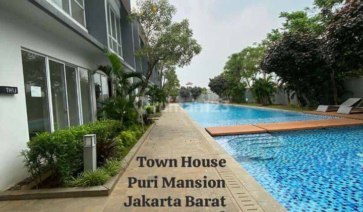 Town House Puri Mansion
jakarta Barat Dengan View Pool  1