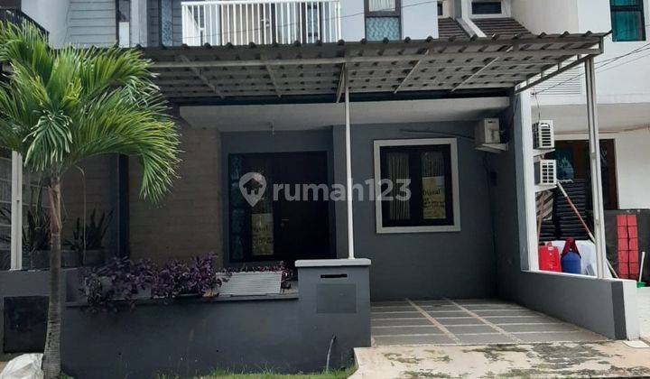 Rumah 2 lt  renovasi depan taman di cluster Harmoni harapan indah 1