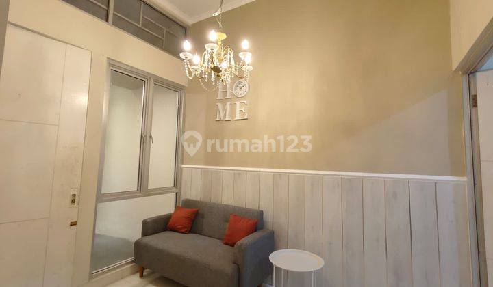 ruang tamu rumah baru renovasi dalam cluster