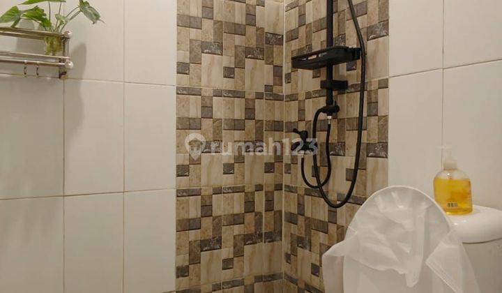 kamar mandi rumah baru renovasi dalam cluster