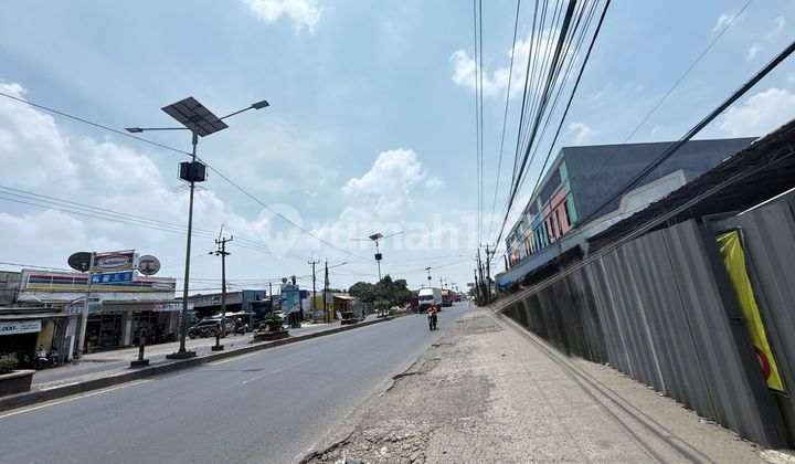 Land with a ready-to-use house for sale, Karawang Highway side.