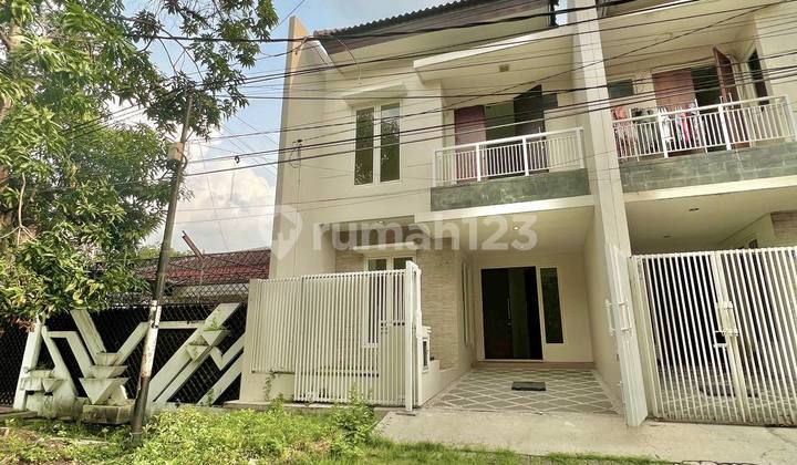 Rumah di Dukuh Kupang Barat 2 Lt Ada Taman Belakang Luas + Garasi