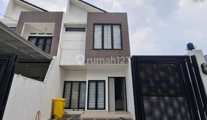 Rumah Minimalis Bangunan Baru Semi Furnished di Cinere 1