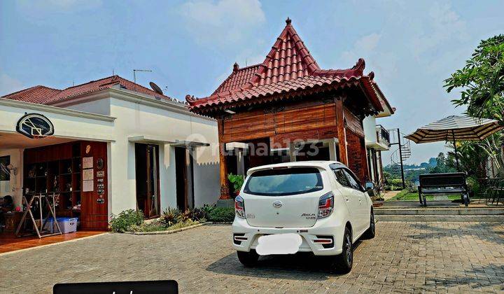 Rumah Bergaya Villa Tropis dengan View Cantik di Serpong 1