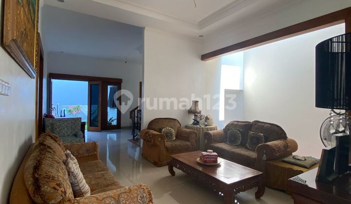 Modern Tropical House with Premium Materials and a Spacious Yard 2