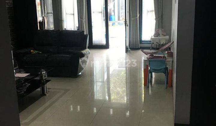 Rumah lux dengan kolam renang di Sukamulya mainroad  2