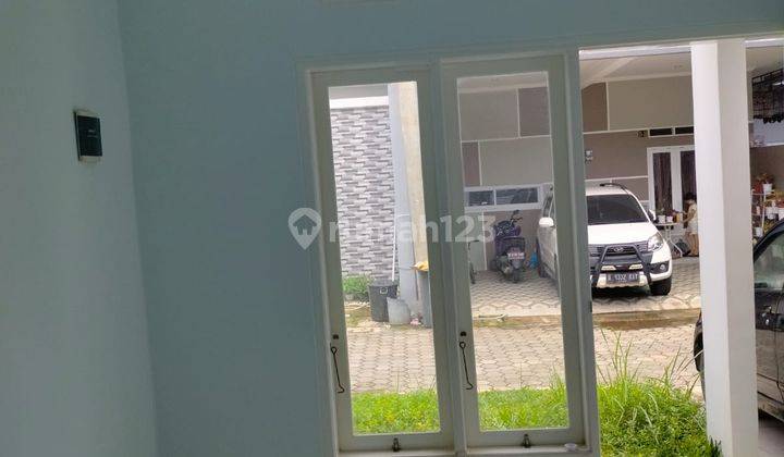 Rumah Minimalis SHM Lingkungan Nyaman Ada Kolam Renang di Bekasi 2