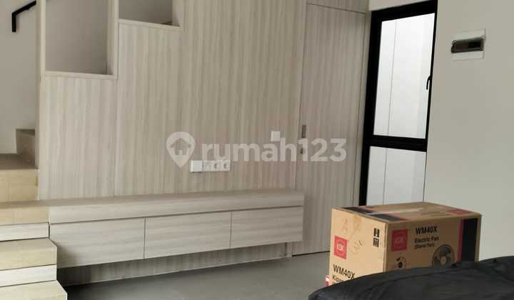 ruang keluarga rumah impresahaus kawasan tabebuya bsd