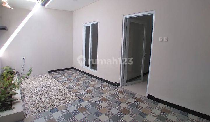 Di  rumah baru dalam komplek ujung Berung indah 8